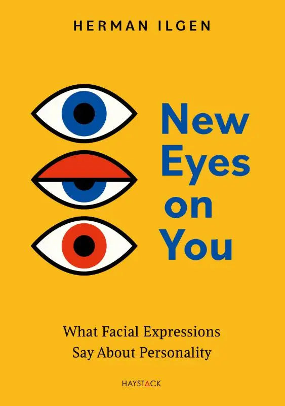 Vibrant geel boek new eyes on you met drie gestileerde ogen en rood omlijnde oog over wat gezichtsuitdrukkingen zeggen over persoonlijkheid