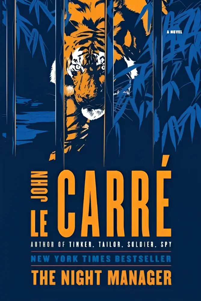 Night manager a novel by john le carré featuring an orange and white tiger through blue bamboo on navy cover