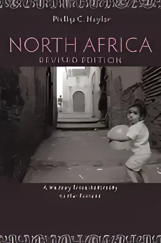 The book cover of North Africa revised edition shows a dark arched alleyway in North Africa with two figures walking away
