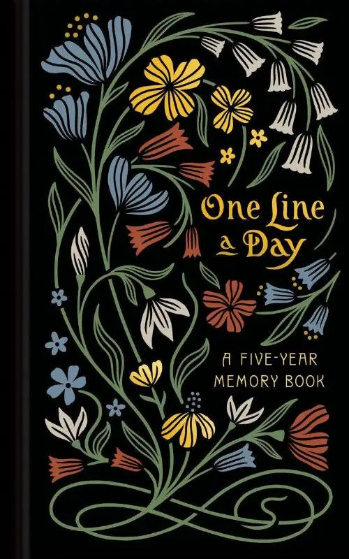 Black hardcover journal with colorful floral illustrations and gold lettering for nouveau one line a day memory book