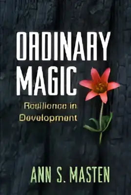 De boekomslag van ordinary magic eerste editie toont een roze bloem en de titel in witte letters