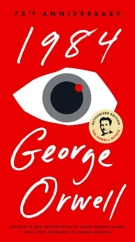Rood hardcover boek van orwell george met witte gestileerde tekst en groot oog op de cover van nineteen eighty-four