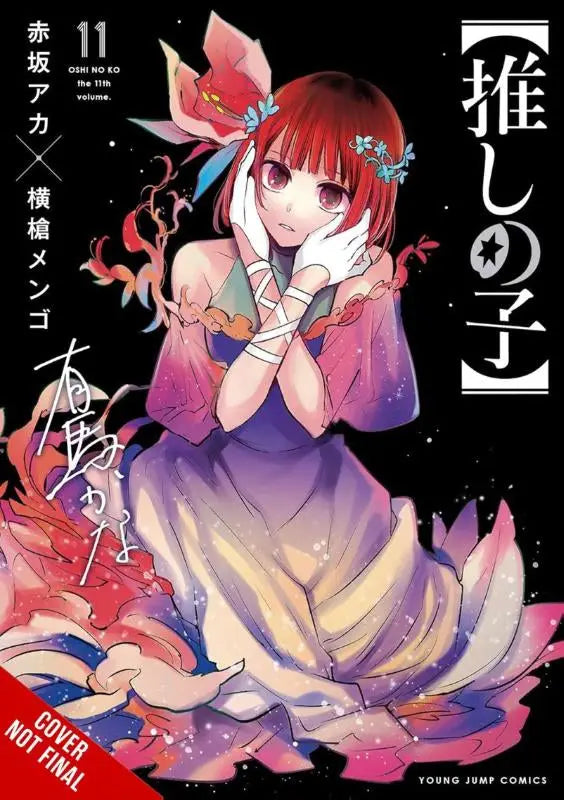 De cover van oshi no ko volume 11 toont een roodharig anime meisje in een paarse en roze jurk met bloemenaccessoires
