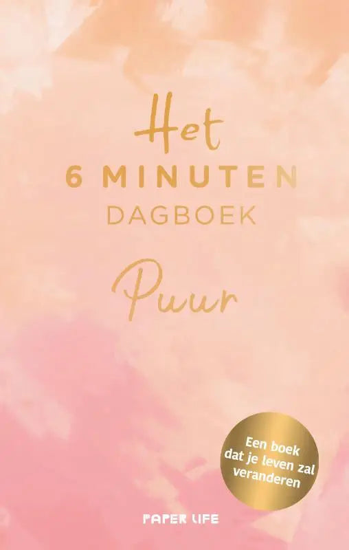 Een zachtroze minuten dagboek journal met gouden folietekst en een ronde gouden sticker van dominik spenst puur