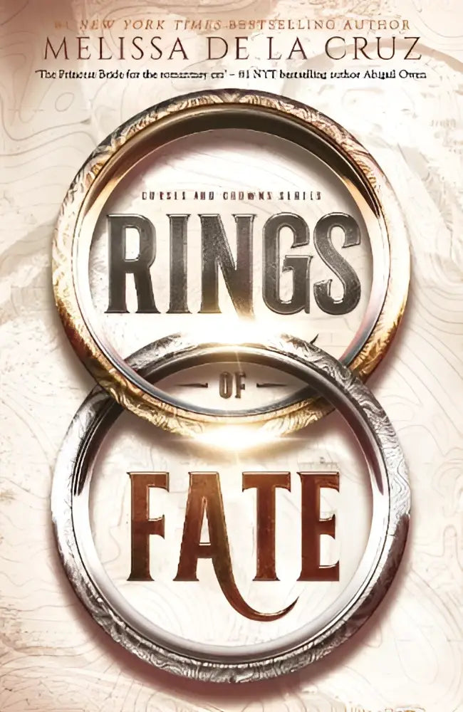 Het boek rings of fate toont de titel in metalen letters op een achtergrond van twee gouden ringen