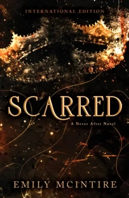 The book cover of scarred by emily mcintire features ornate gold lettering and a golden mask with fiery flames on dark background