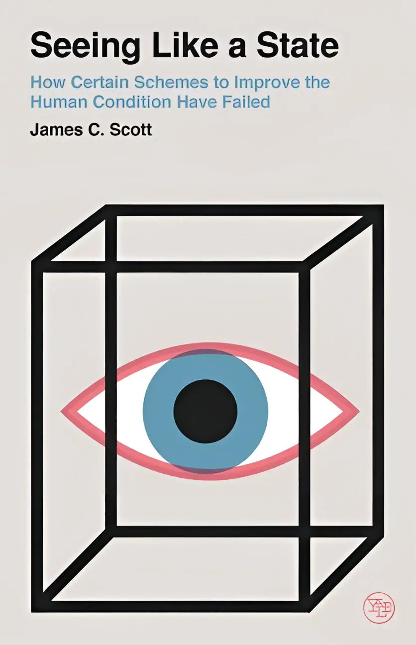 De boekcover van seeing like a state toont een minimalistisch ontwerp met een blauwe iris en roze oogrand over schemes to improve the human condition