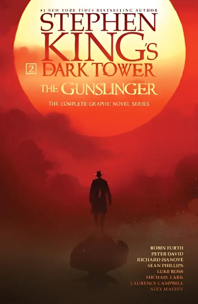 De dark tower de gunslinger omnibus met donkere silhouet tegen vurige rode en oranje lucht en grote zon