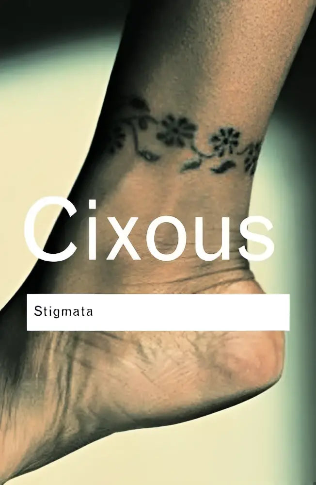 Black floral tattoo on the ankle featured in stigmata escaping texts design representing escaping texts theme