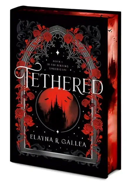 Zwart gebonden hardcover boek tethered van elayna r met rood zilveren bloemenontwerp en gespoten randen vampire prince