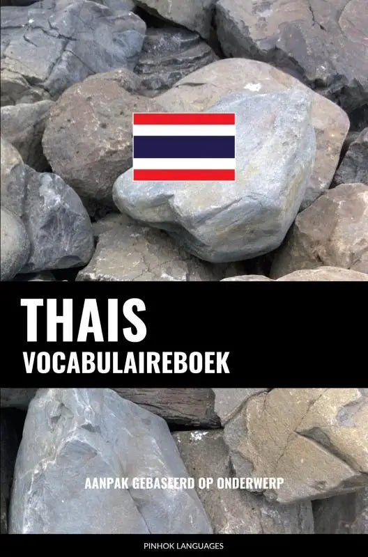Thais vocabulaireboek met de thailandse vlag op grijze stenen een aanpak gebaseerd op onderwerp