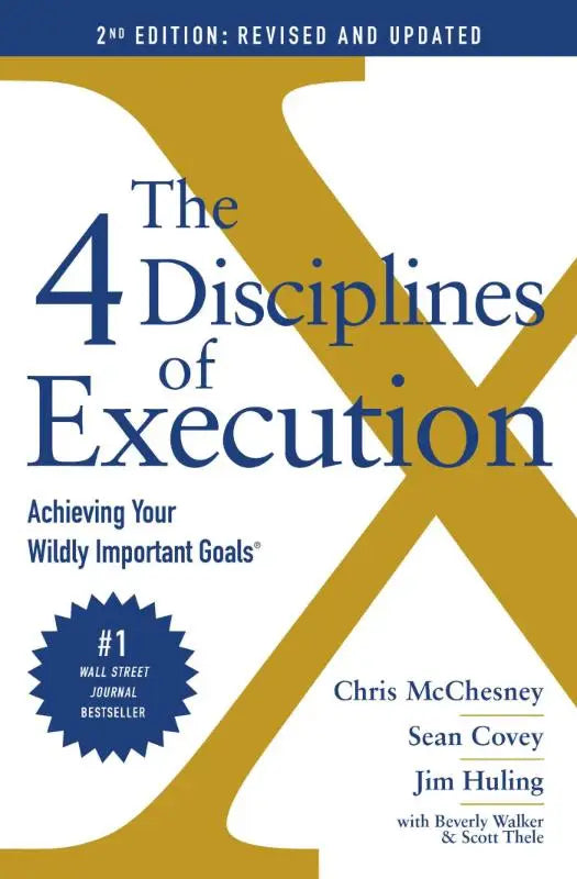 De 2de editie cover van the 4 disciplines of execution boek met een gouden en marineblauw ontwerp voor achieving your wildly important goals