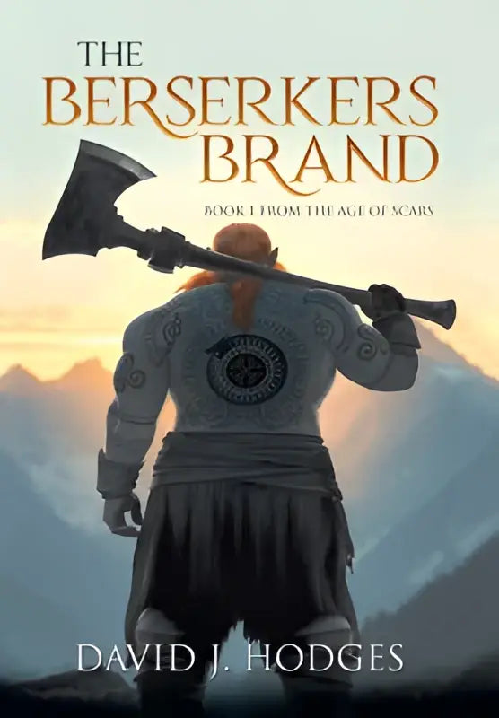 De boekcover van the berserkers brand book 1 uit the age toont een gespierde rodeharige krijger met tatoeages