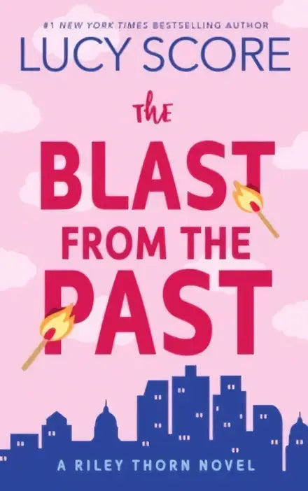 Boekthe blast from the past van lucy score met roze omslag, rode titel en blauwe stadsgezichtsilhouet