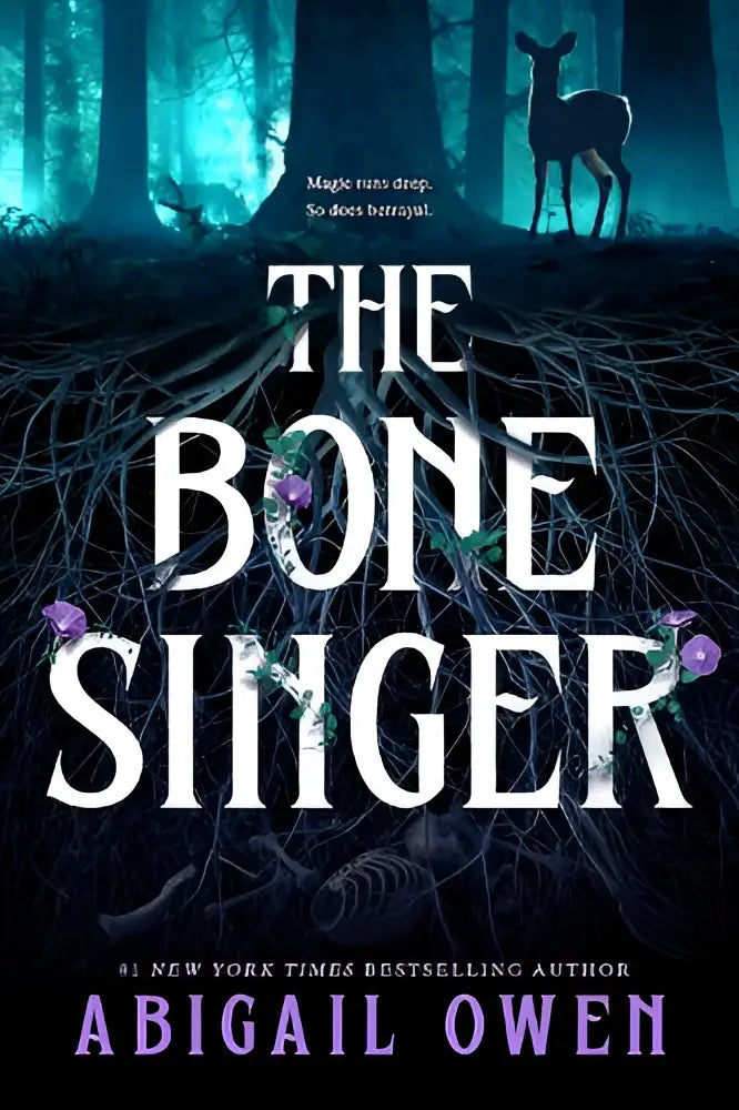 The bone singer is a dark fantasy novel by abigail owen with a teal forest cover featuring a deer silhouette and purple flowers