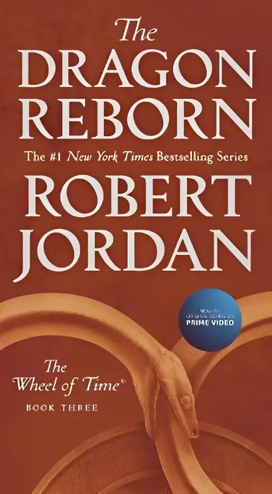 The dragon reborn book three of the wheel of time with orange cover and gold dragon imagery