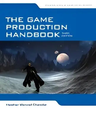 The game production handbook hardcover book with dark blue cover showing a lone figure on a desolate landscape under two moons