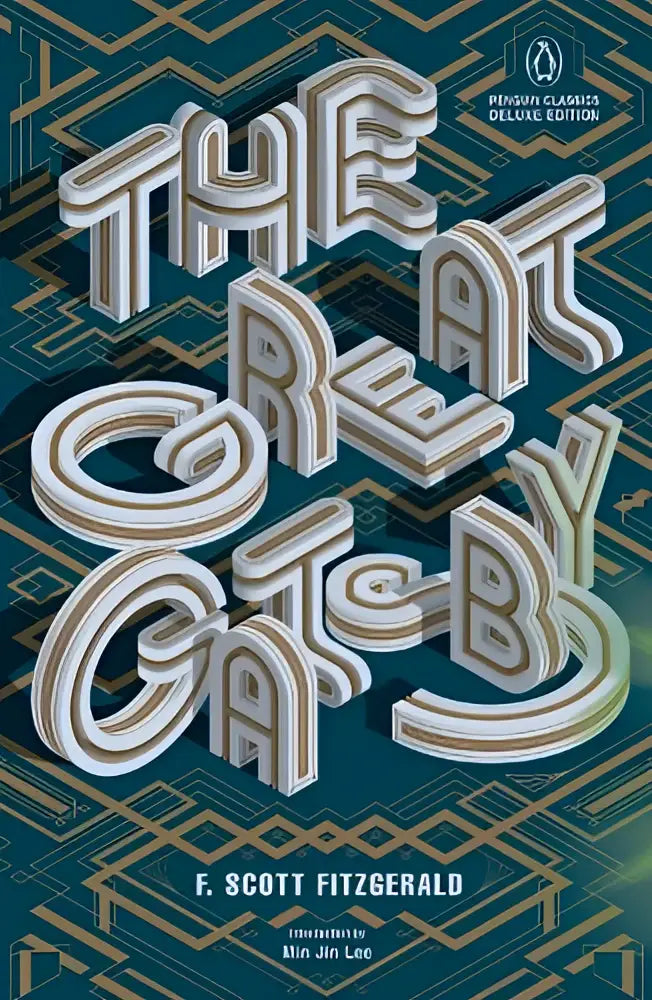 The great gatsby paperback in a penguin classics deluxe edition with a classic cover design