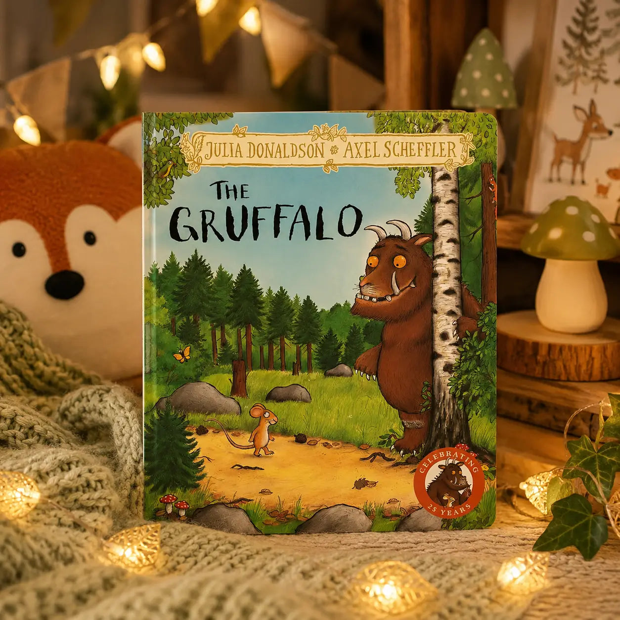 The gruffalo hardback gift edition by julia donaldson and axel scheffler with brown gruffalo peeking behind birch tree
