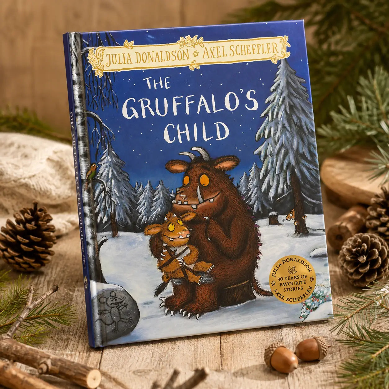 Hardback gift edition van the gruffalo’s child door julia donaldson en axel scheffler met blauwe omslag en illustratie