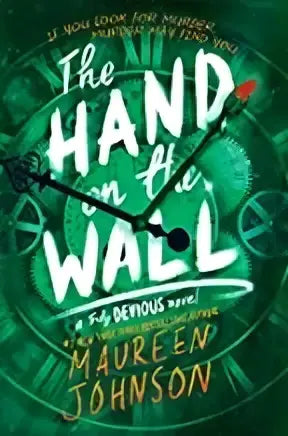 The hardcover book the hand on the wall by maureen johnson features a green cover with hands illustration and clock face