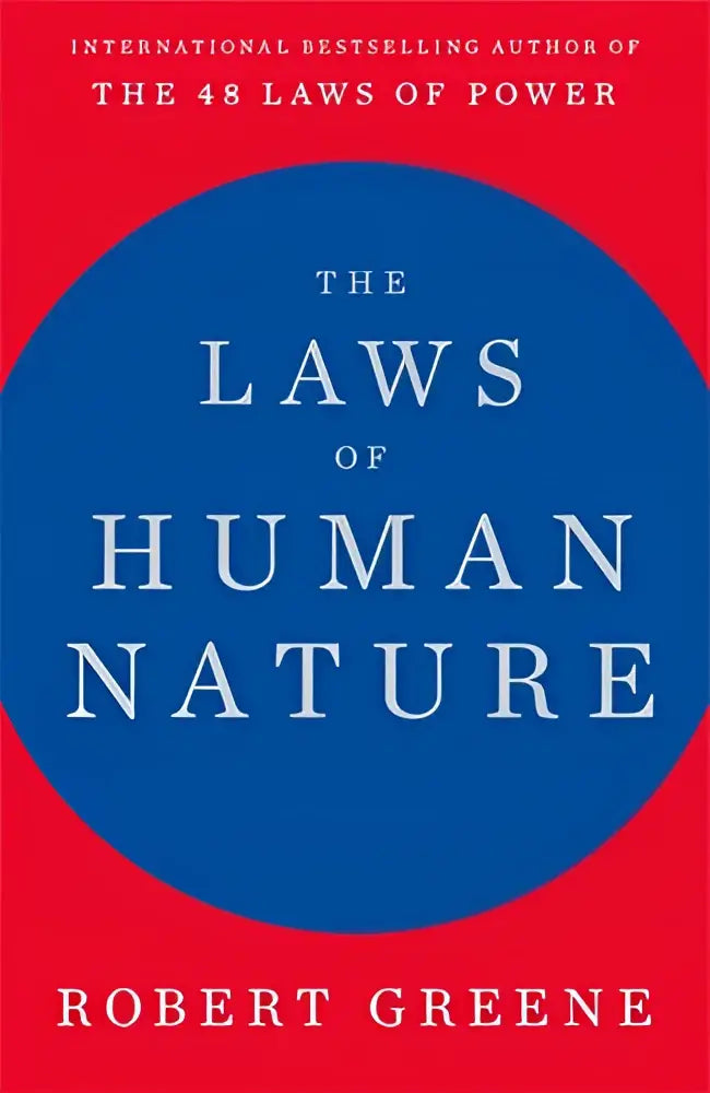 Rode hardcover boek the laws of human nature door robert greene met blauw cirkelontwerp en witte tekst