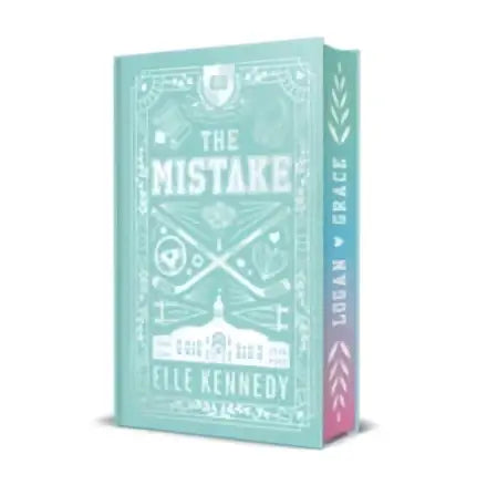 A mint green hardcover collector’s edition book titled the mistake by elle kennedy with printed edges and designed endpapers