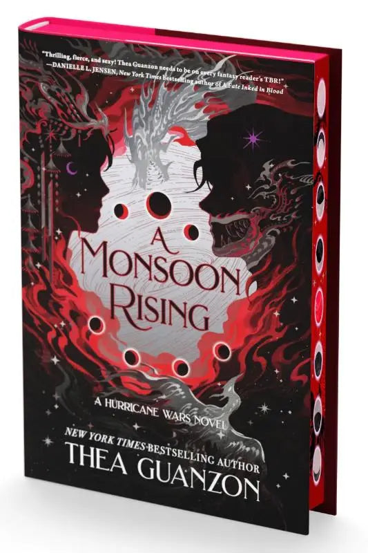 Een hardcover boek the monsoon rising van thea guanzon met een dramatische roodzwarte omslag en silhouetten tegen kosmische patronen