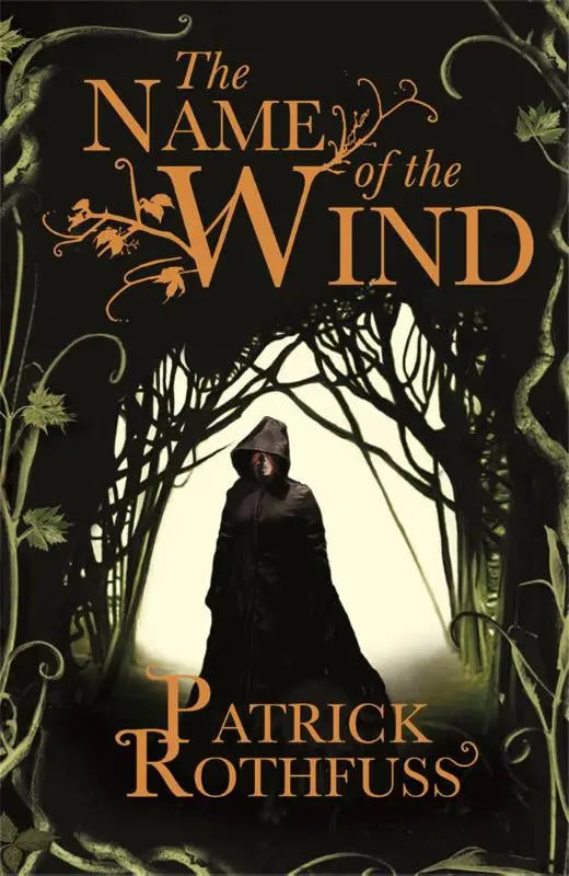 The name of the wind hardcover with ornate black and gold cover featuring a hooded figure is the legendary fantasy masterpiece
