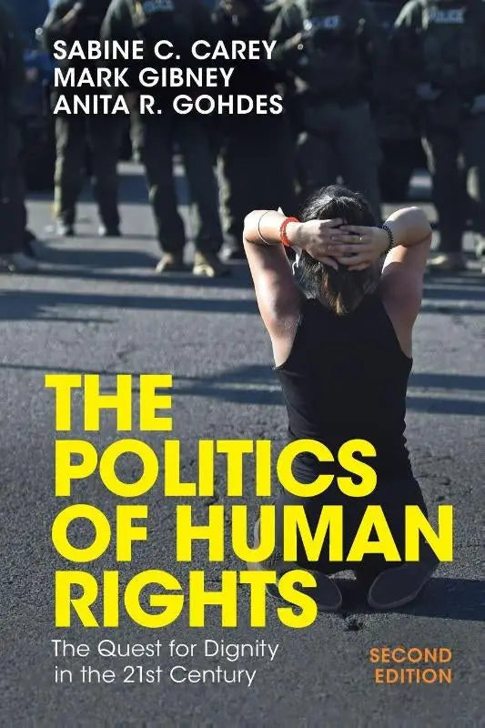 The politics of human rights second edition book cover with bold yellow text over a person kneeling highlighting human rights issues
