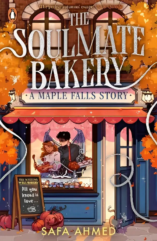 The soulmate bakery boekcover toont een charmante bakkerij met herfstbladeren en pompoenen in warme tinten