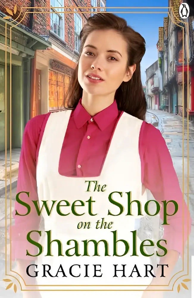 The sweet shop on the shambles paperback door gracie hart met illustratie van vrouw in roze en wit voor bakstenen gebouwen