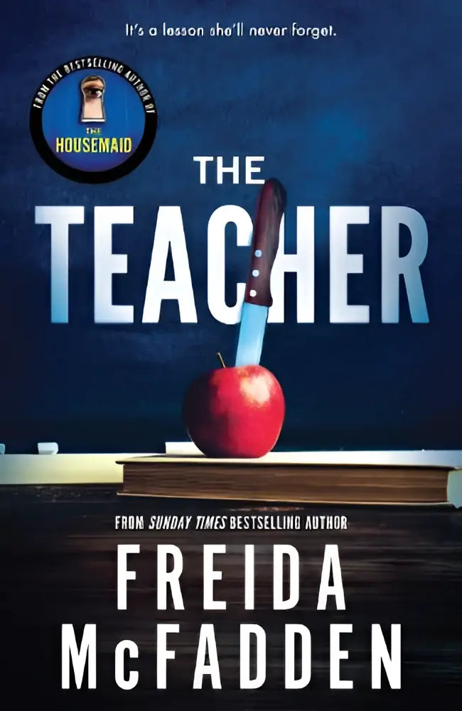 A red apple with a knife stuck in it against a dark blue background for the teacher by the times bestselling author