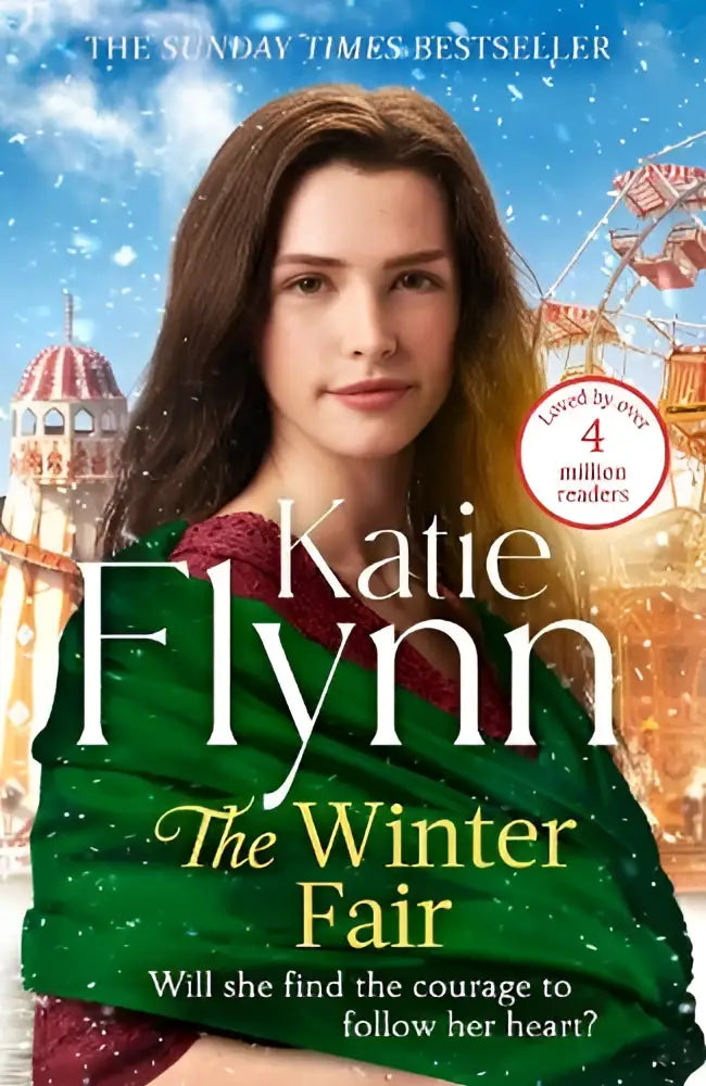 A woman with long brown hair wearing a green shawl over a red dress at the winter fair snowy fairground