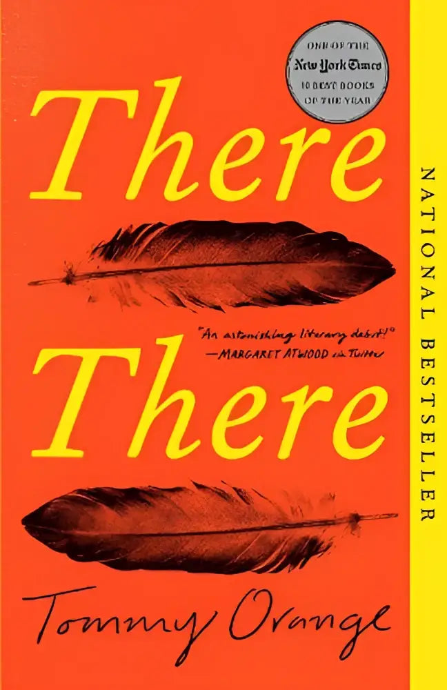 The book cover of there there features bold yellow letters on orange with two dark brown feathers between the title words