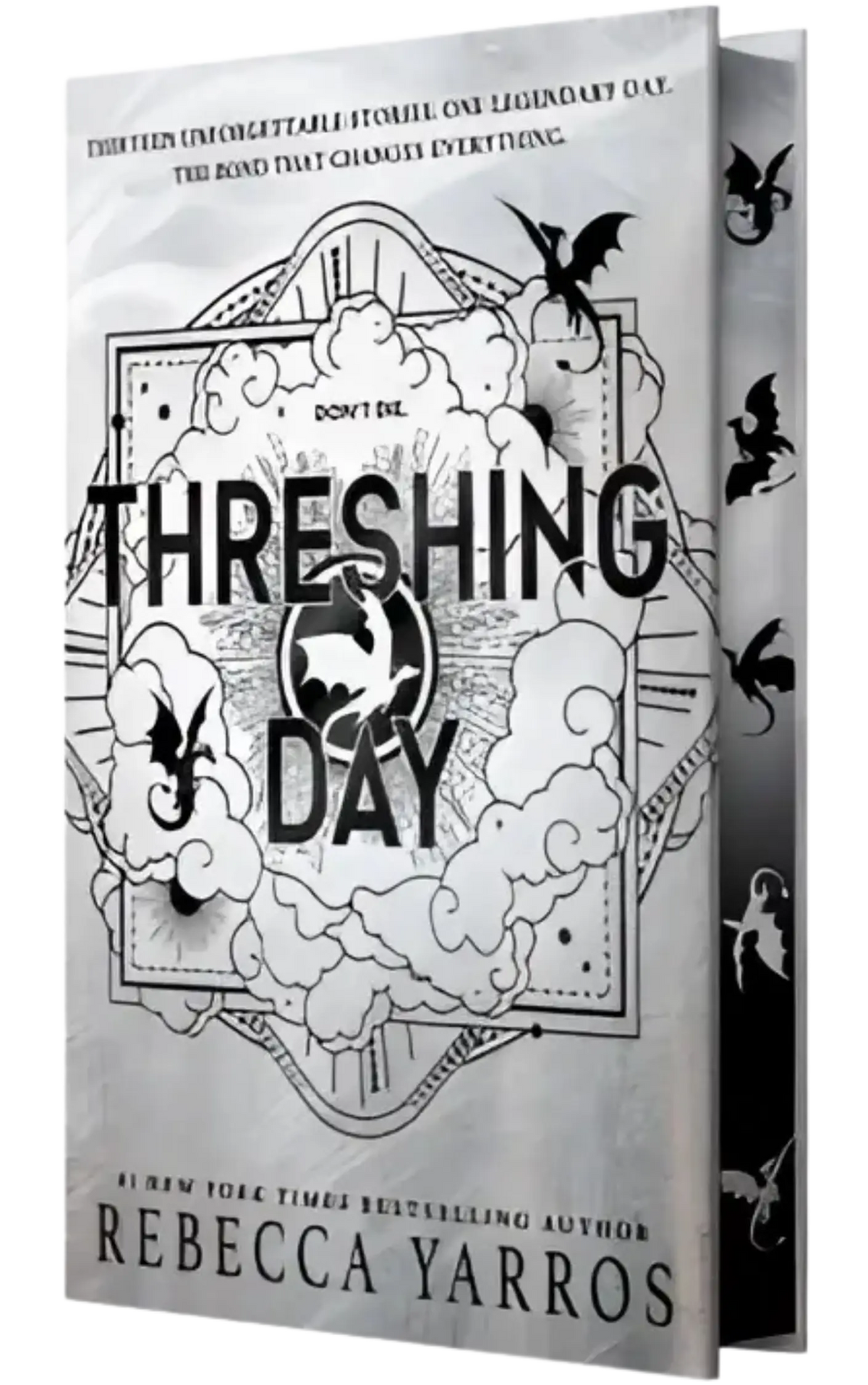 Grijs hardcover boek threshing day van rebecca yarros met zwarte illustraties van draken en wolken