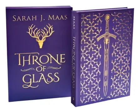Paarse hardcover Throne of Glass collector’s edition met gouden foliedetails en zwaardontwerp op de voorkant