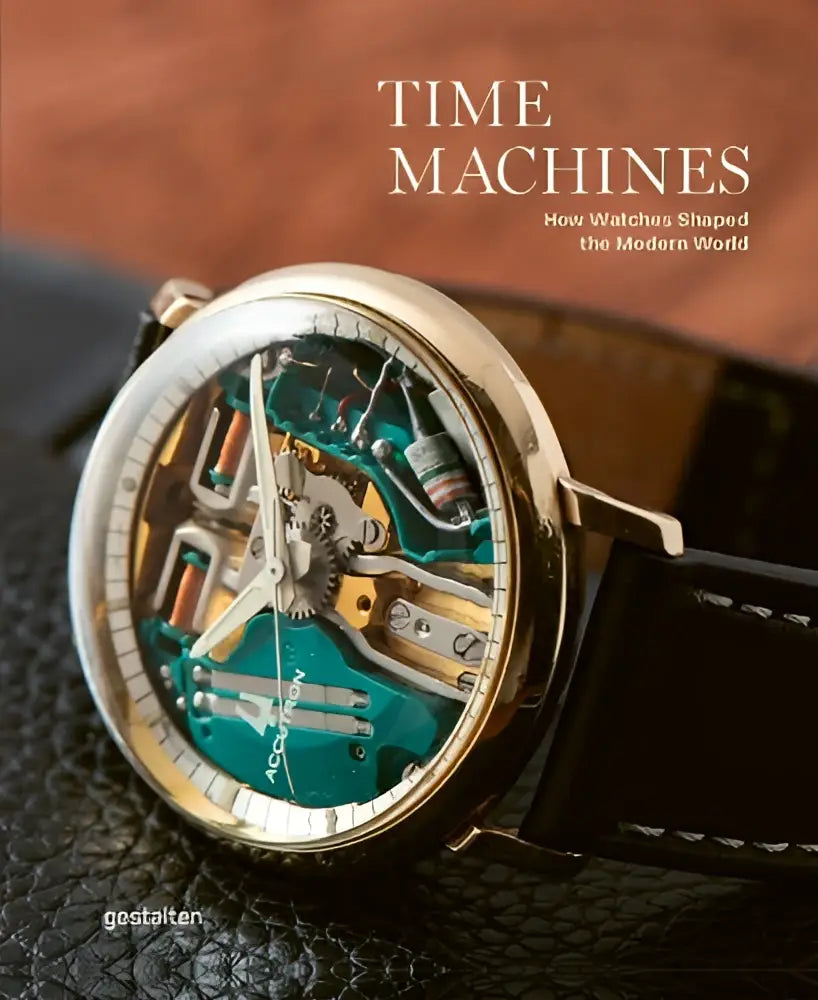 Een goudkleurig open herenhorloge met turkoois-zilveren mechaniek en zwarte leren band uit watches and their era