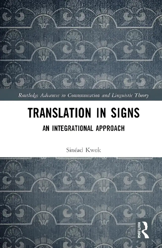 Donkerblauw boek met zilveren ornamenten getiteld translation in signs an integrational approach door sinaé kwock