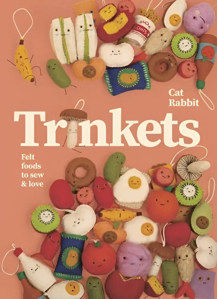 A collection of colorful felt foods with cute embroidered faces perfect for foods to sew and love projects