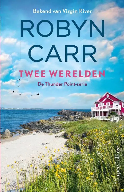 A vibrant red and white cottage with a wraparound porch on a grassy cliff overlooking the ocean in twee werelden