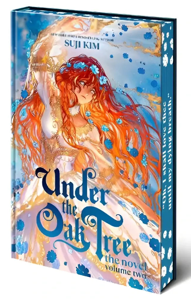 Een prachtig geïllustreerd hardbackboek onder the oak tree volume two door suji kim met een eterisch vrouwelijk figuur en blauwe bloemen op een hemelblauwe achtergrond