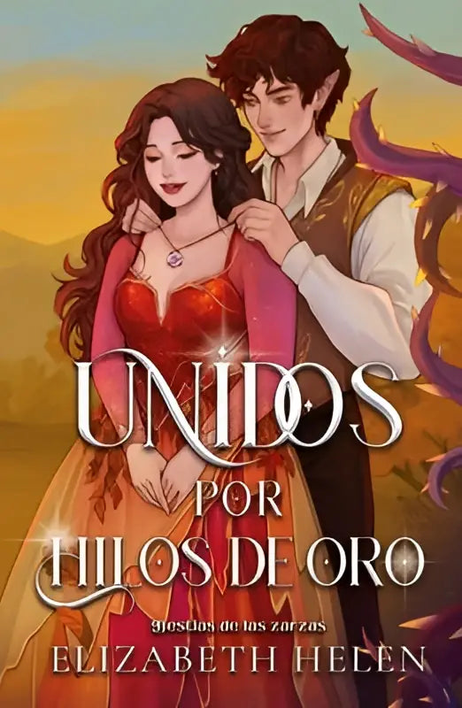 De cover van unidos por hilos de oro toont een romantische illustratie van een elfenpaar tegen een warme zonsondergang