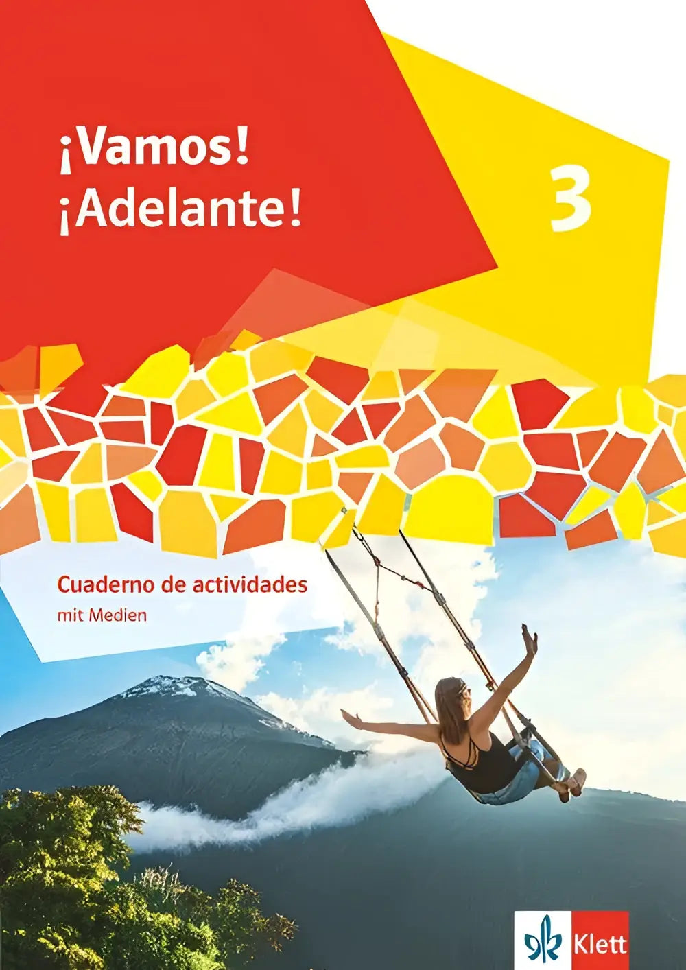 De cover van het ¡vamos adelante! 3 cuaderno de actividades mit medien toont een rood gele geometrische mozaïek en een vrouw die parapent over bergen