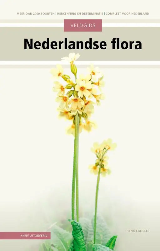 De cover van de veldgids nederlandse flora toont gele sleutelbloemen met groene stengels op een lichte achtergrond