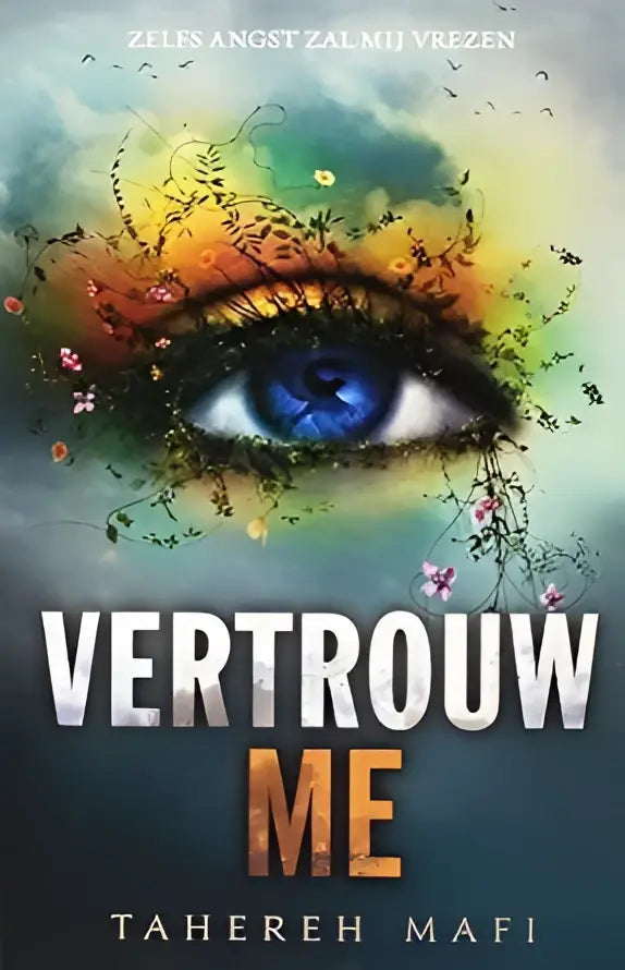Het boek vertrouw me van tahereh mafi toont een blauwe oogillustratie met kleurrijke bloem- en rankmotieven, touching juliette deel 3