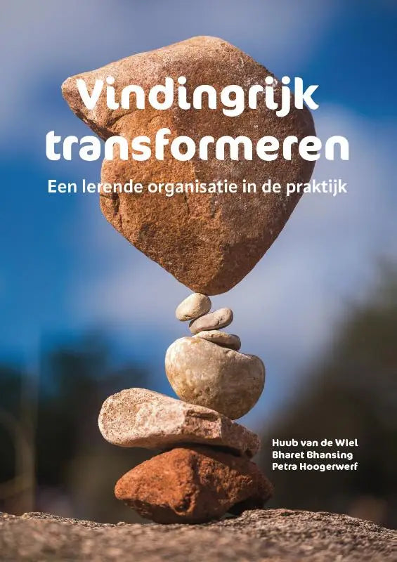 Een evenwichtige stapel gladde aarde-tonen stenen met een grotere bruine steen bovenop voor vindingrijk transformeren lerende organisatie