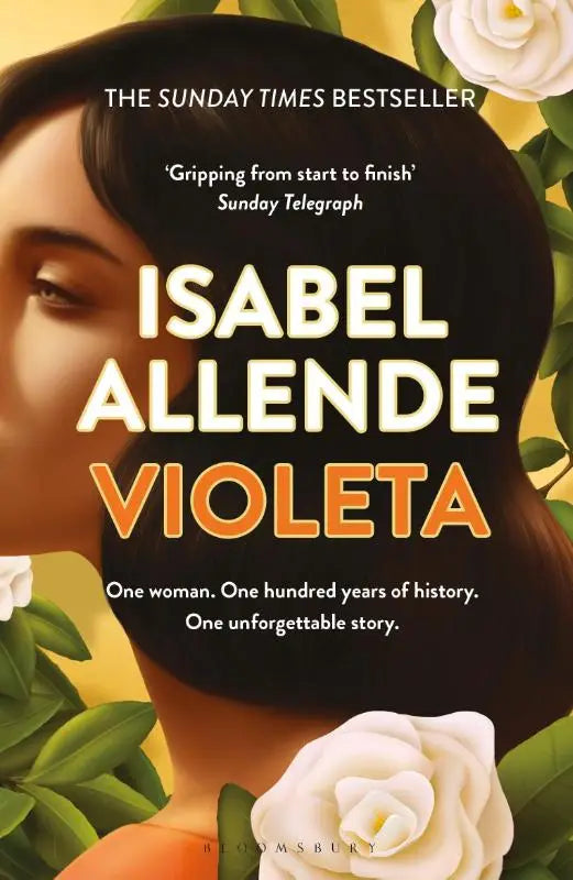 De boekcover van violeta van isabel allende toont een vrouw met donker haar en witte rozen in warmgele tinten storytelling at its best