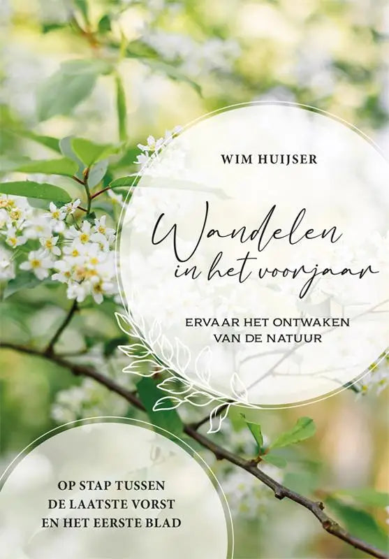 Een prachtig vormgegeven paperback wandelen in het voorjaar door wim huijser met witte bloesems en groene bladeren