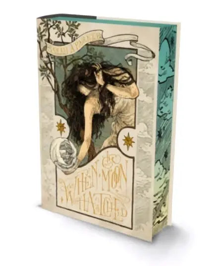 Art deco-stijl boek when the moon hatched deluxe edition met crèmekleurige omslag en goudfolie tekst van sarah a parker